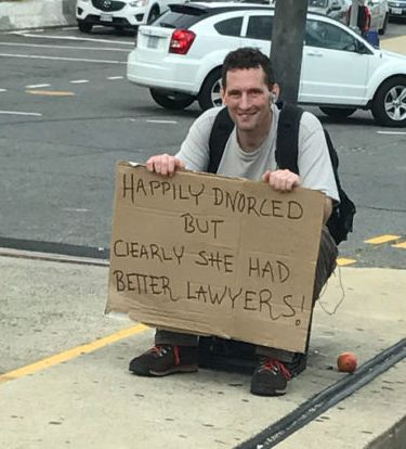 man holding sign